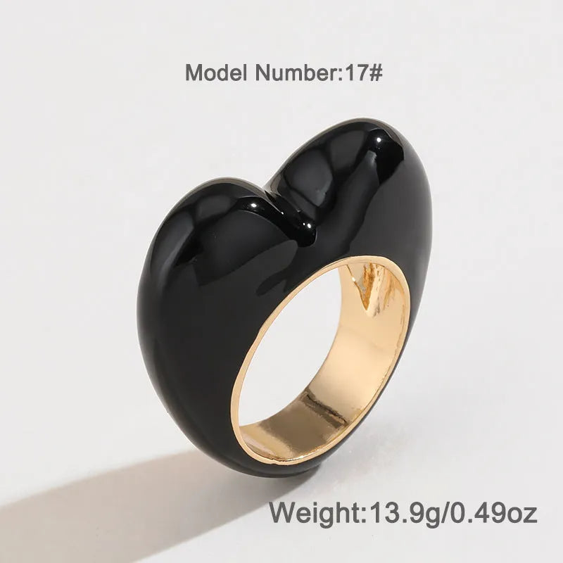 Three-dimensional enamel heart ring in zinc alloy showing raised design detail