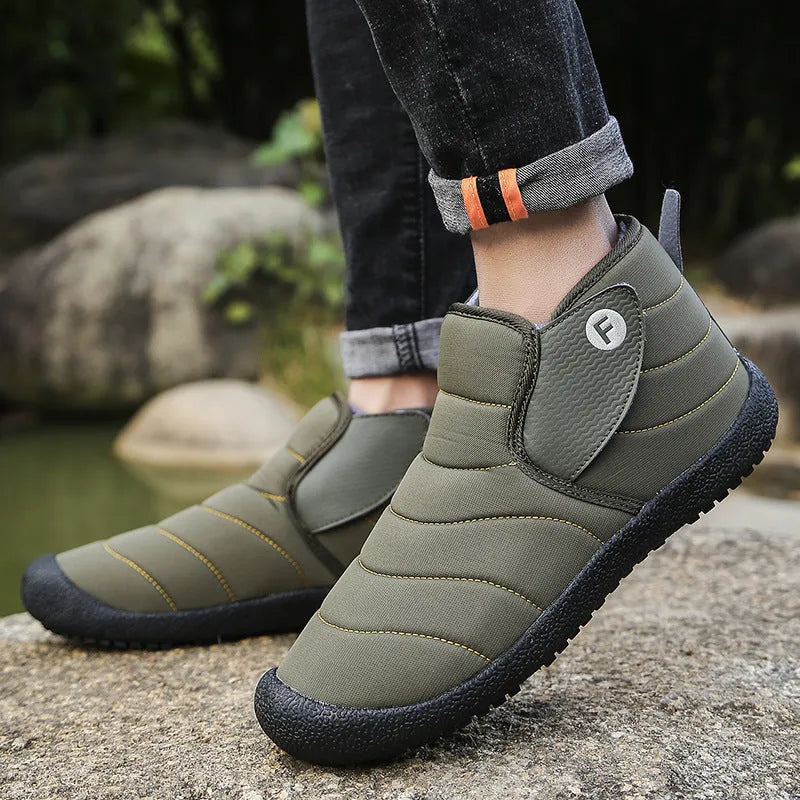 Men's waterproof snow boots in black with non-slip rubber soles and cotton upper