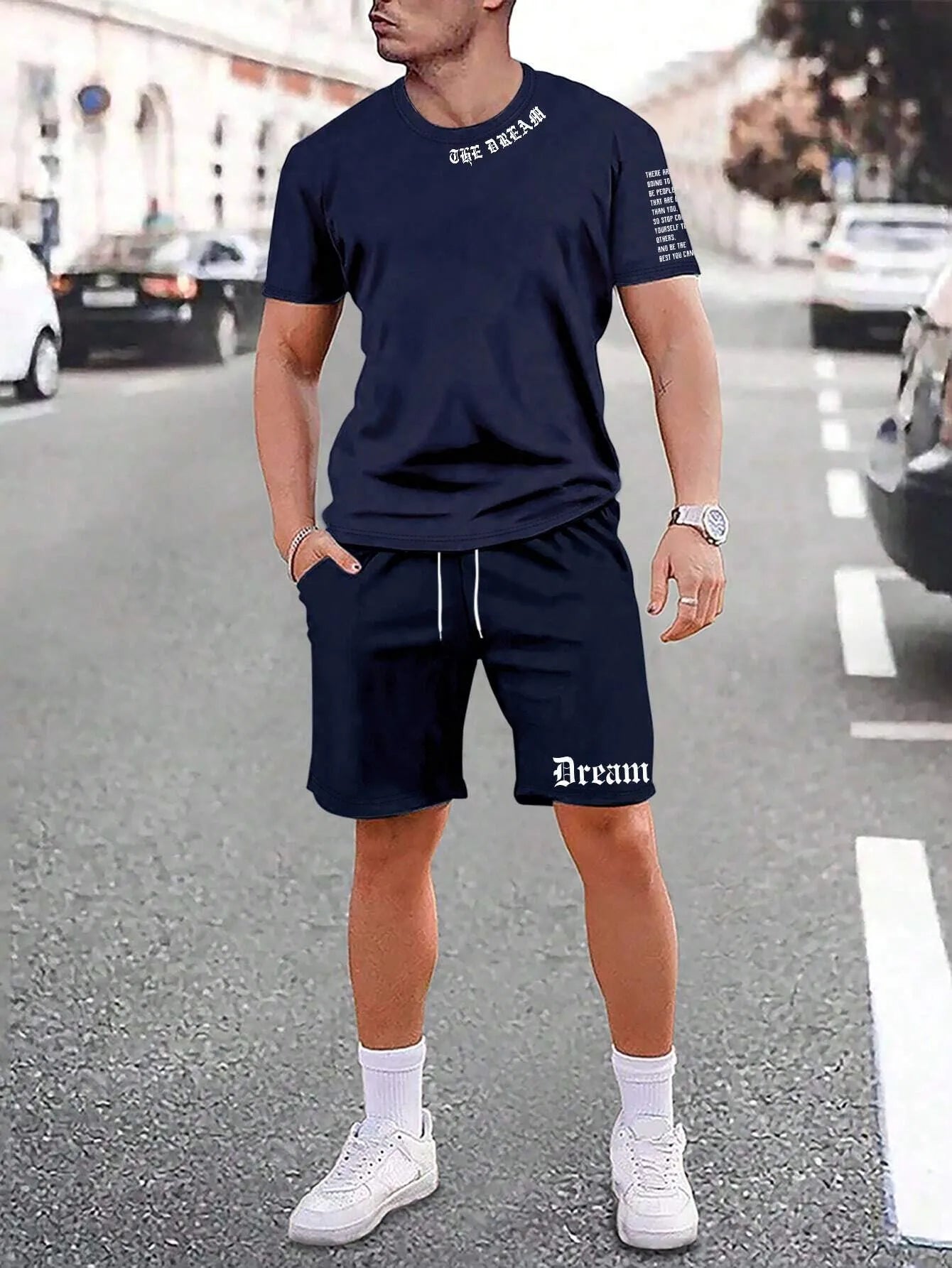 Men's blue short-sleeved sports top and matching shorts suit set on a hanger