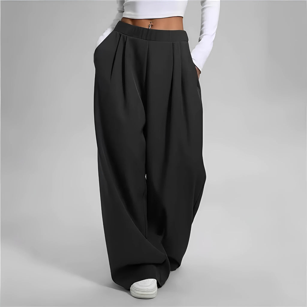 Women's high-waisted loose straight pants with pockets in black polyester fabric