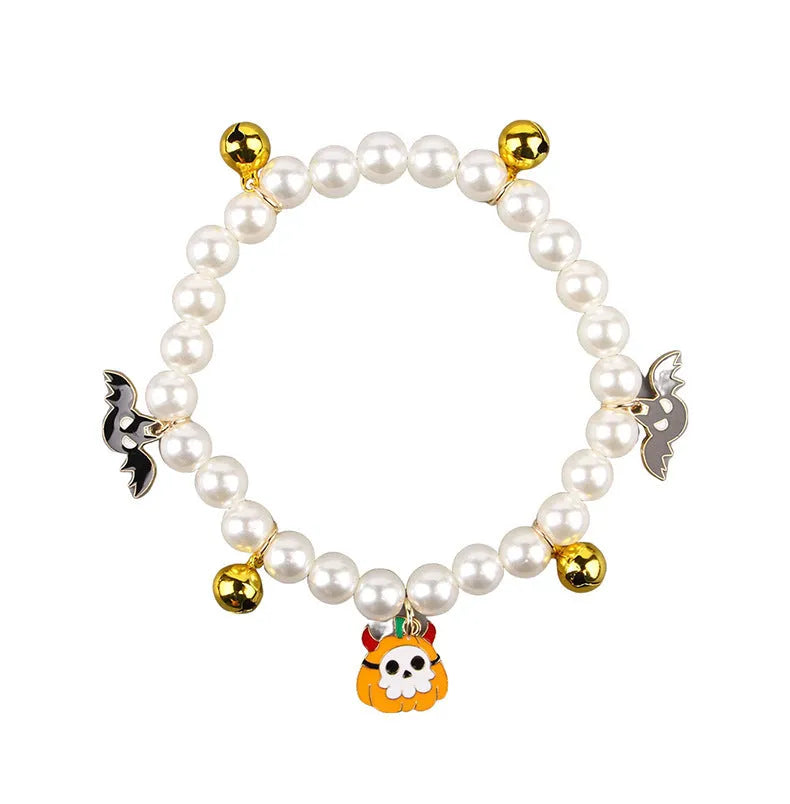 Halloween cat collar with simulated pearl necklace design showing pumpkin pattern variations
