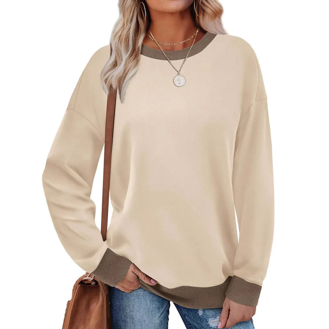 Women's loose striped long-sleeved top in polyester fabric showing round neck and seven colour options