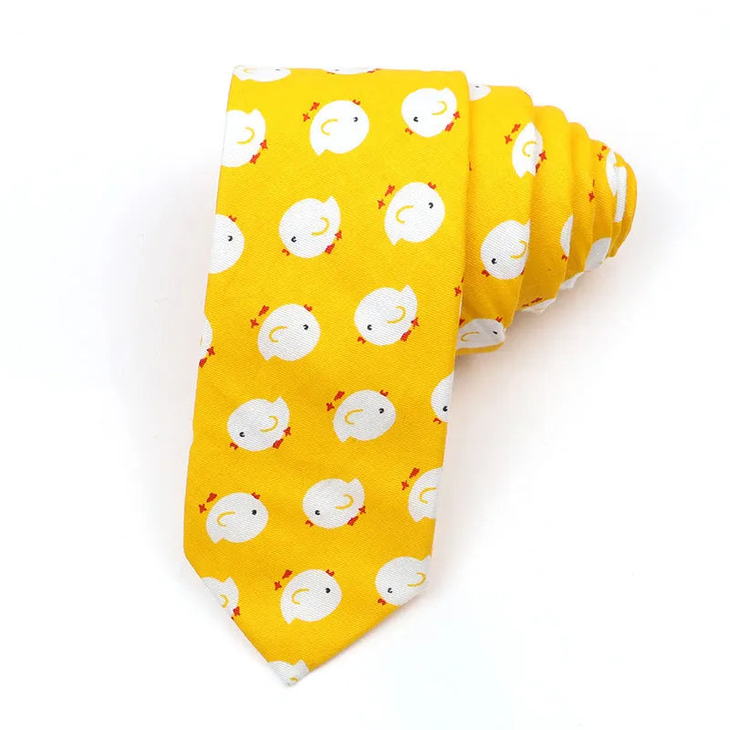 Narrow Korean style cotton bow tie with a printed cartoon pattern in various colours.