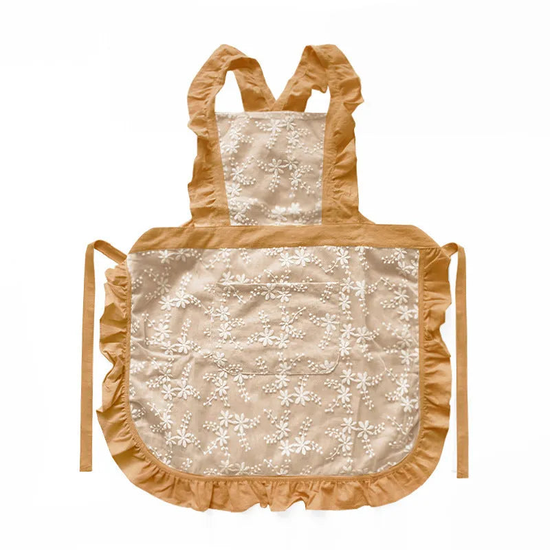 Cotton linen lace X strap apron in light pink colour on white background kitchen household use
