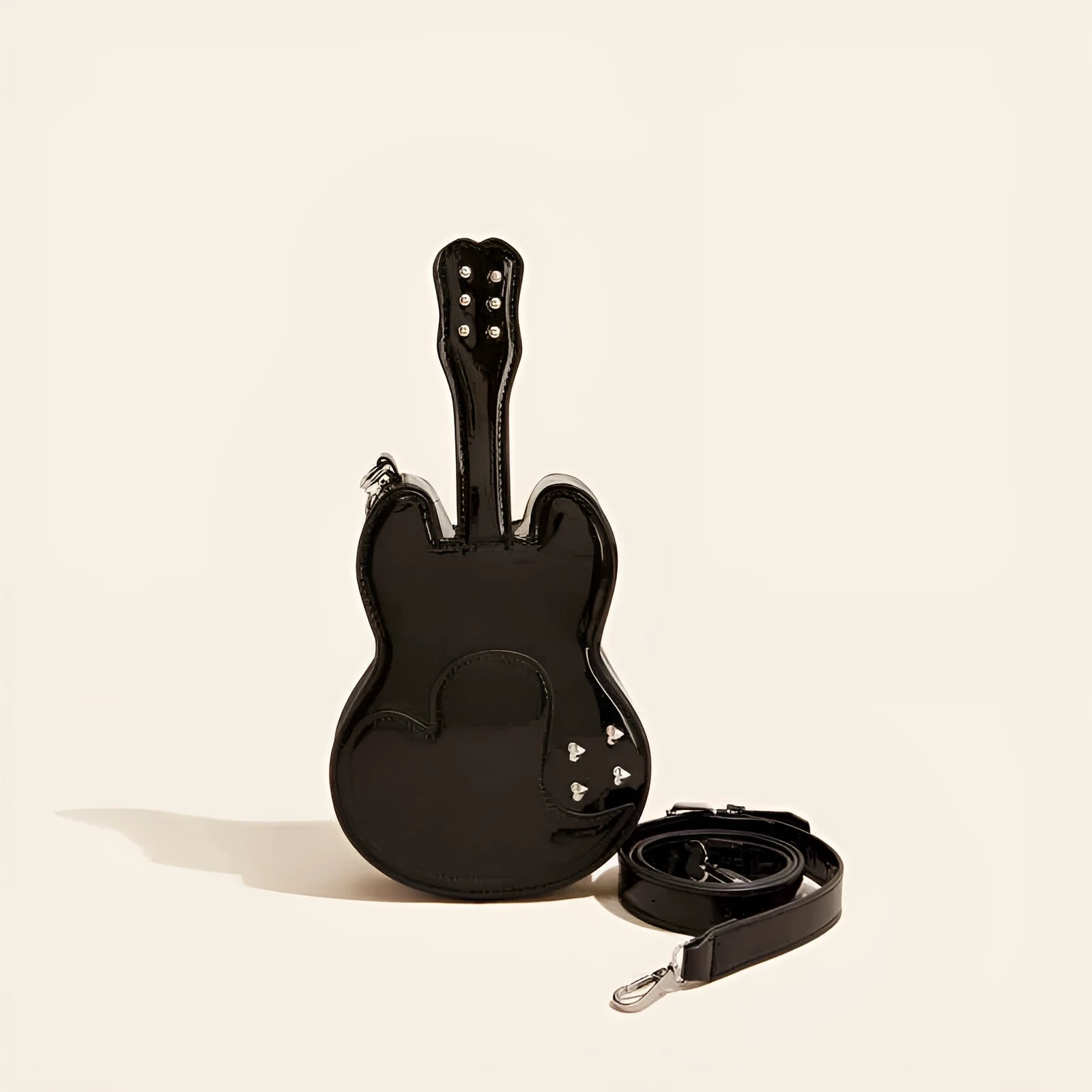 Guitar-inspired creative arts PU crossbody shoulder bag in one of five colours: silver, black, yellow, blue, or pink.