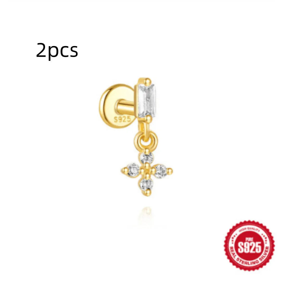 S925 sterling silver water drop shaped earrings with a flat spiral geometric design on a white background.