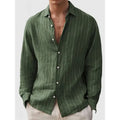 Man wearing a loose-fit striped short-sleeve cardigan-style polyester shirt for casual wear.
