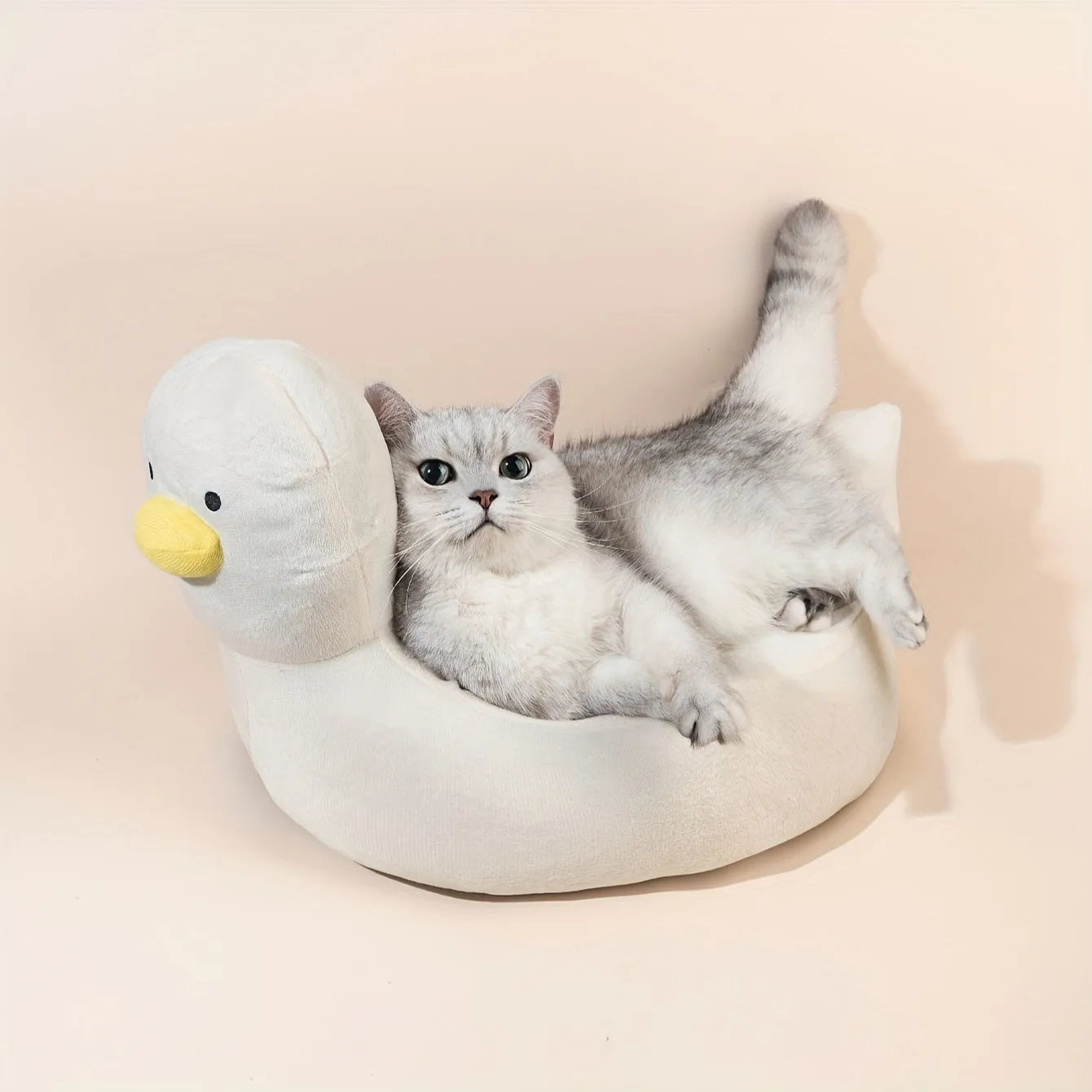 Blue duck-shaped fluffy pet bed for small dogs and cats with unique pattern