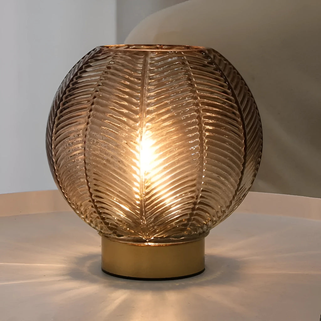 Wireless battery miniature decorative lamp with amber light in geometric stereo modern simplicity design on a tabletop
