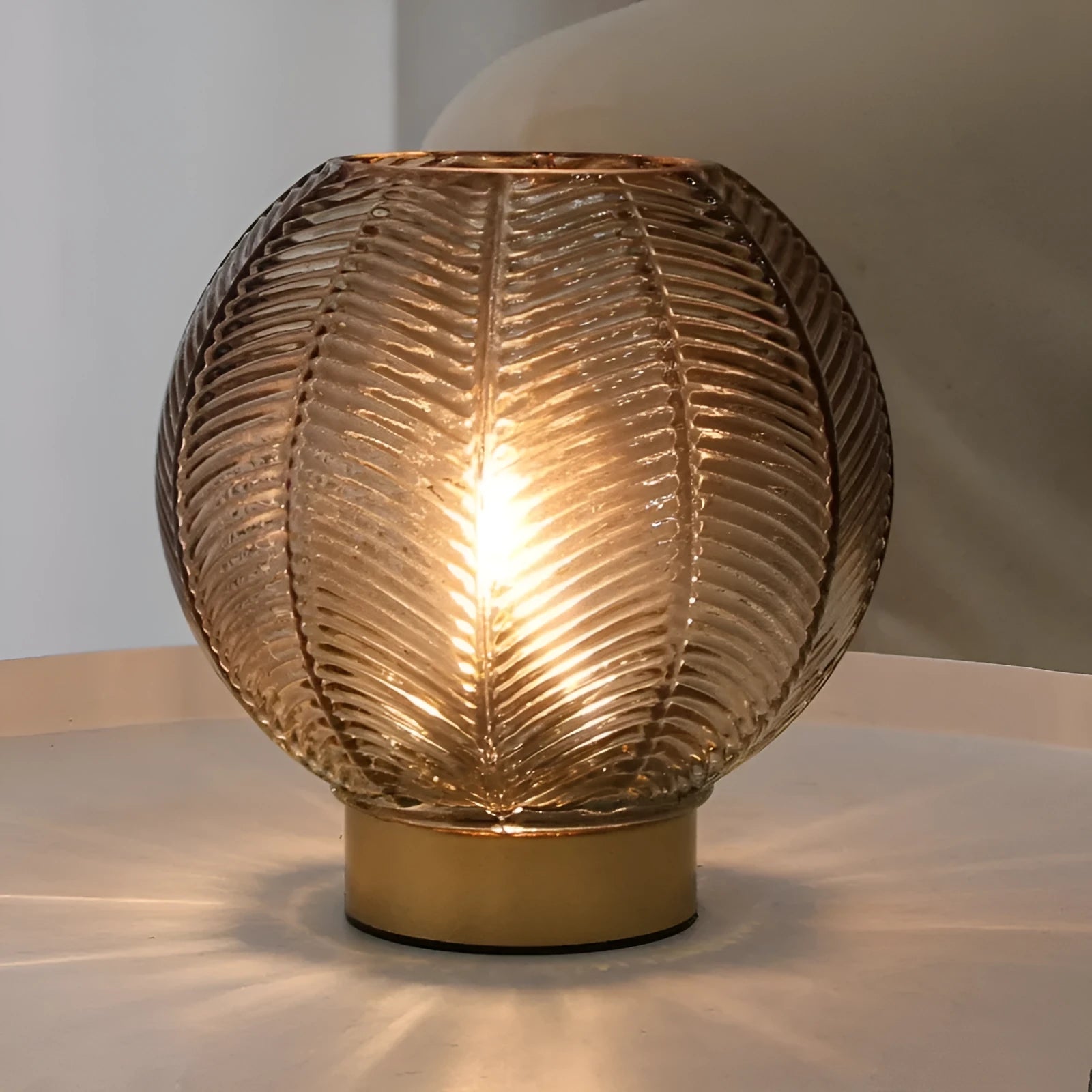 Wireless battery miniature decorative lamp with amber light in geometric stereo modern simplicity design on a tabletop
