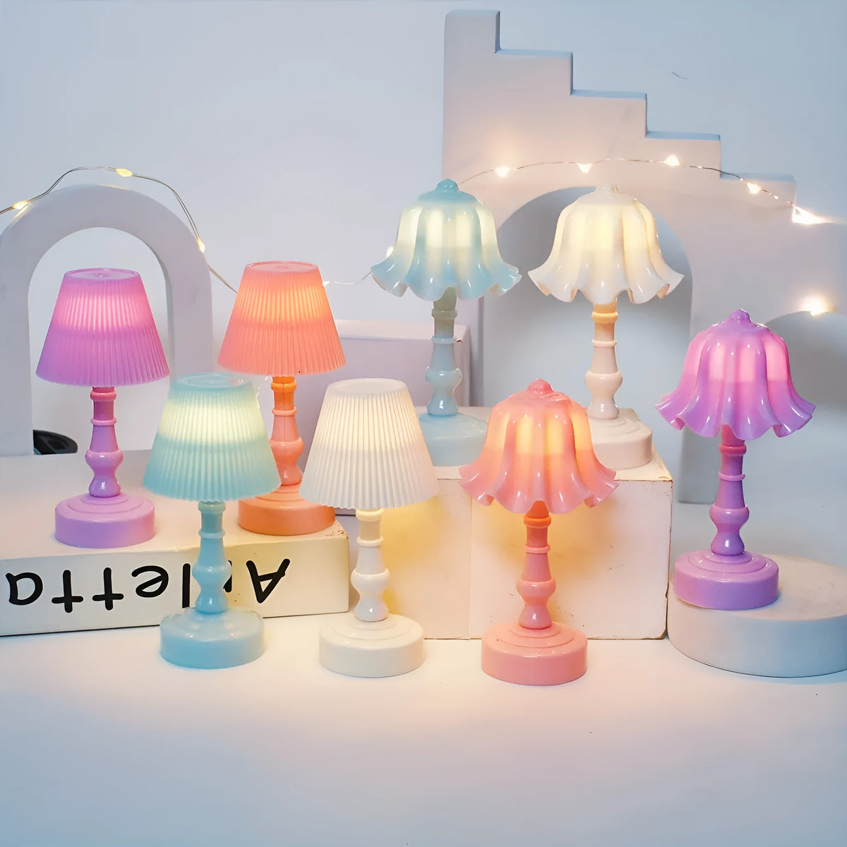 Battery-powered decorative table lamp with LED light, white pleated shade