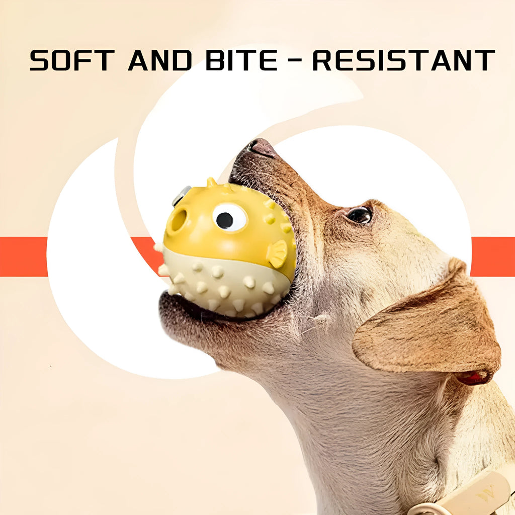 Yellow fish-shaped dog chew toy with textured surface and squeaker for aggressive chewers