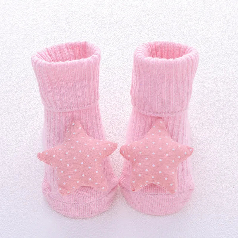 Cotton baby floor socks in multiple designs including panda, bow, and star patterns.