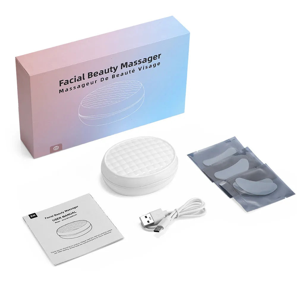 White wireless red light eye massager with EMS function for facial beauty treatment