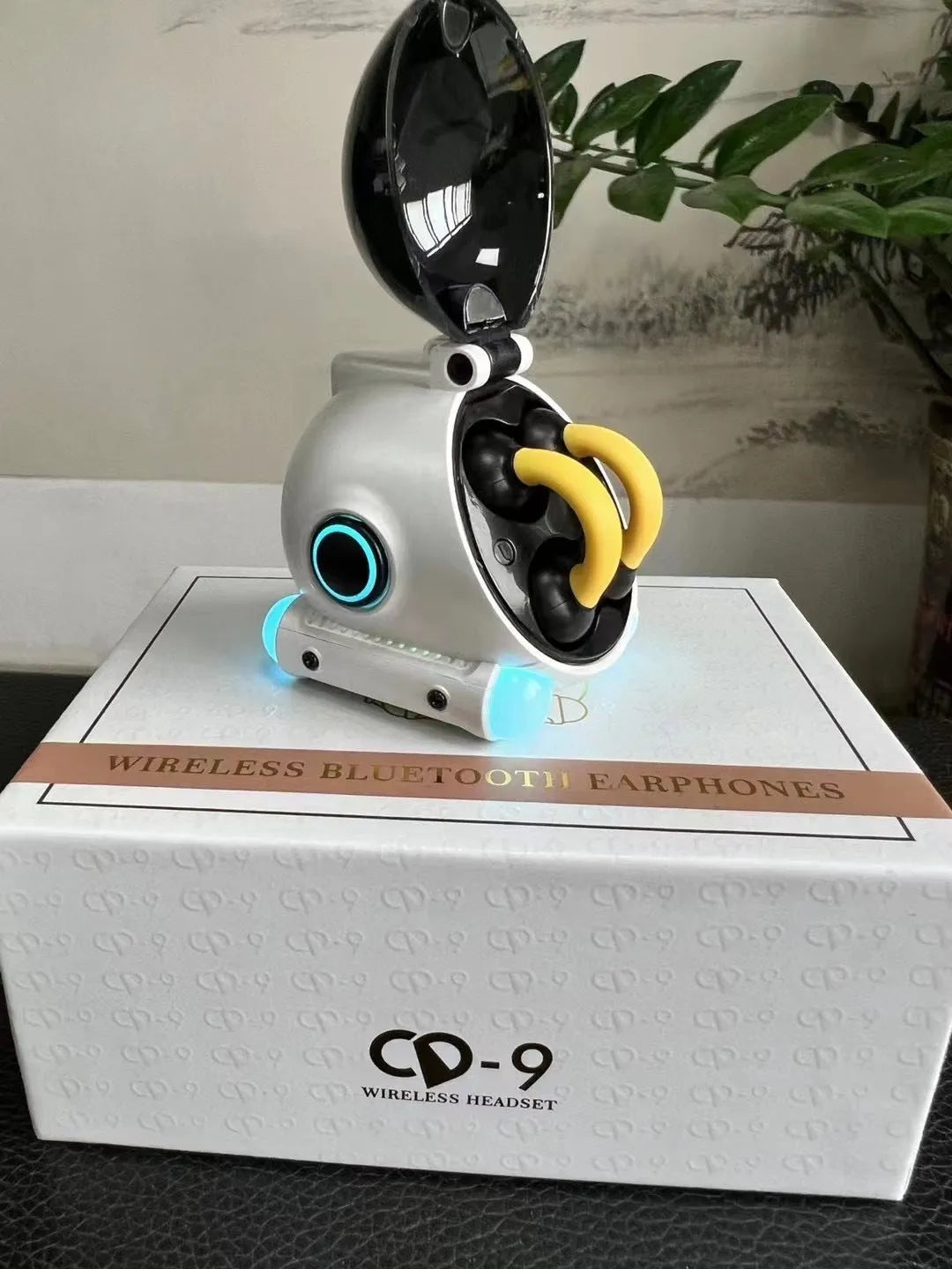 Clip-on wireless Bluetooth sports headset in black or white showing clip detail