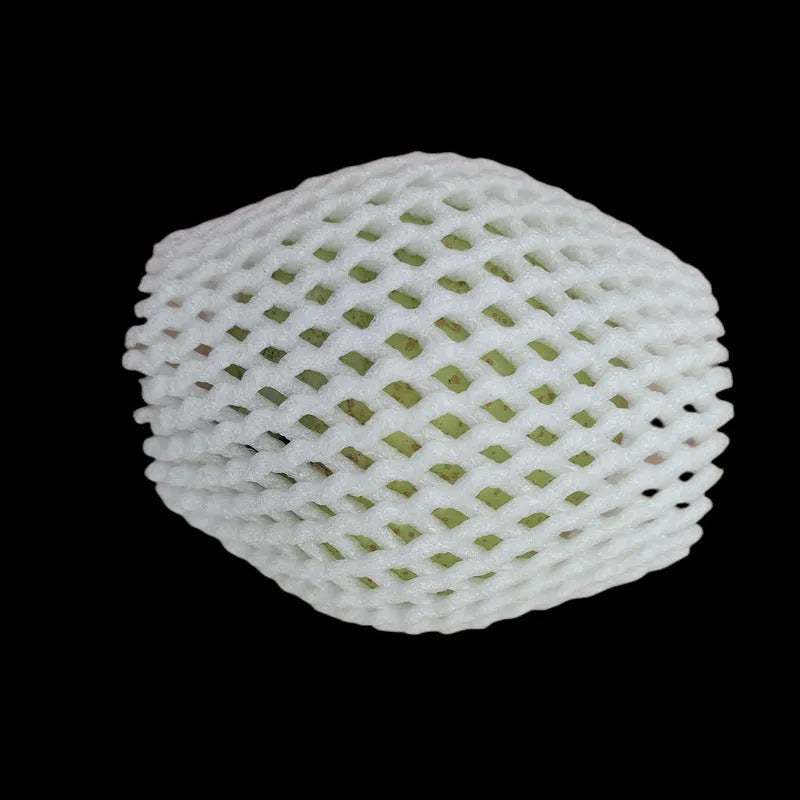 White foam protective net cover for apples, pears, peaches and oranges.