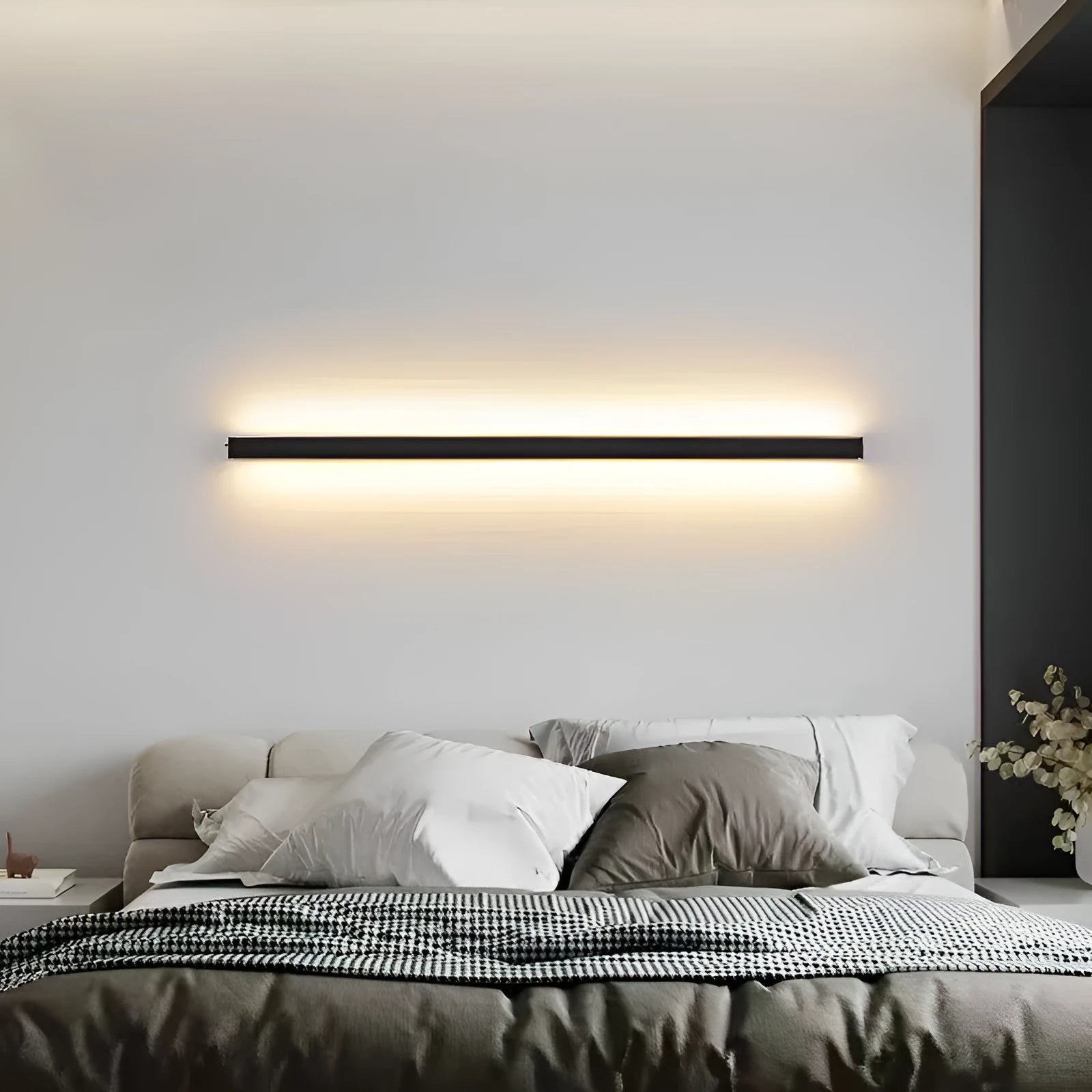 80cm long black aluminium LED wall lamp with a polycarbonate shade, showing three light colour options.