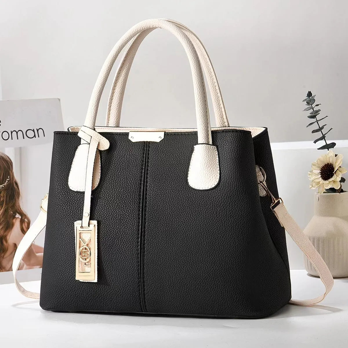 Women's large capacity shoulder bag in soft PU leather with adjustable strap and multiple colour options