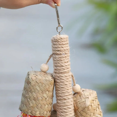 Colourful shredded paper bird toy made from wood and sisal for parrot chewing enrichment