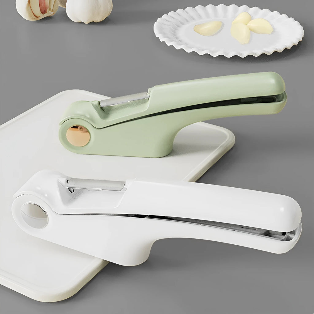 Manual garlic press with ABS handle and stainless steel press mechanism in green colour