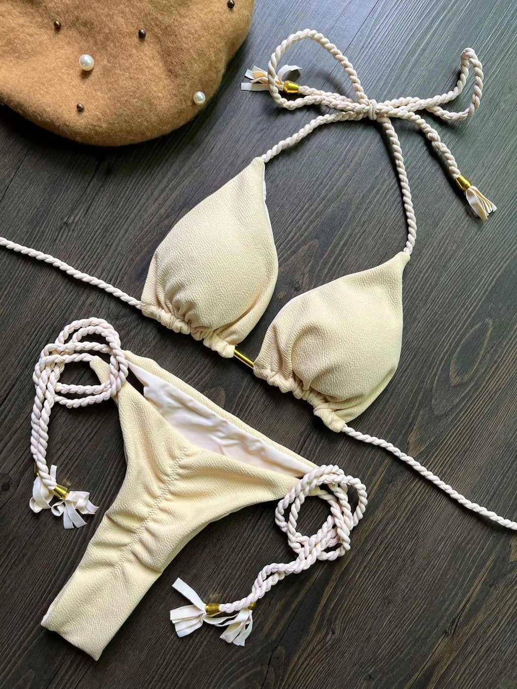 Women's braided rope bikini suit in solid colour, cotton lined, for swimming and wading.