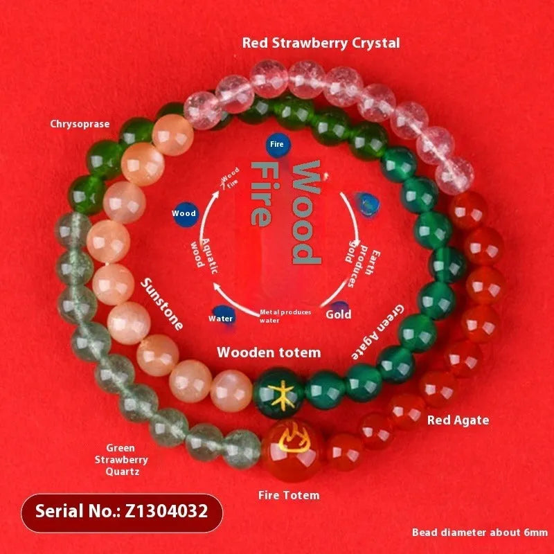 Handmade women's crystal double ring bracelet in five elements colours on a wrist.