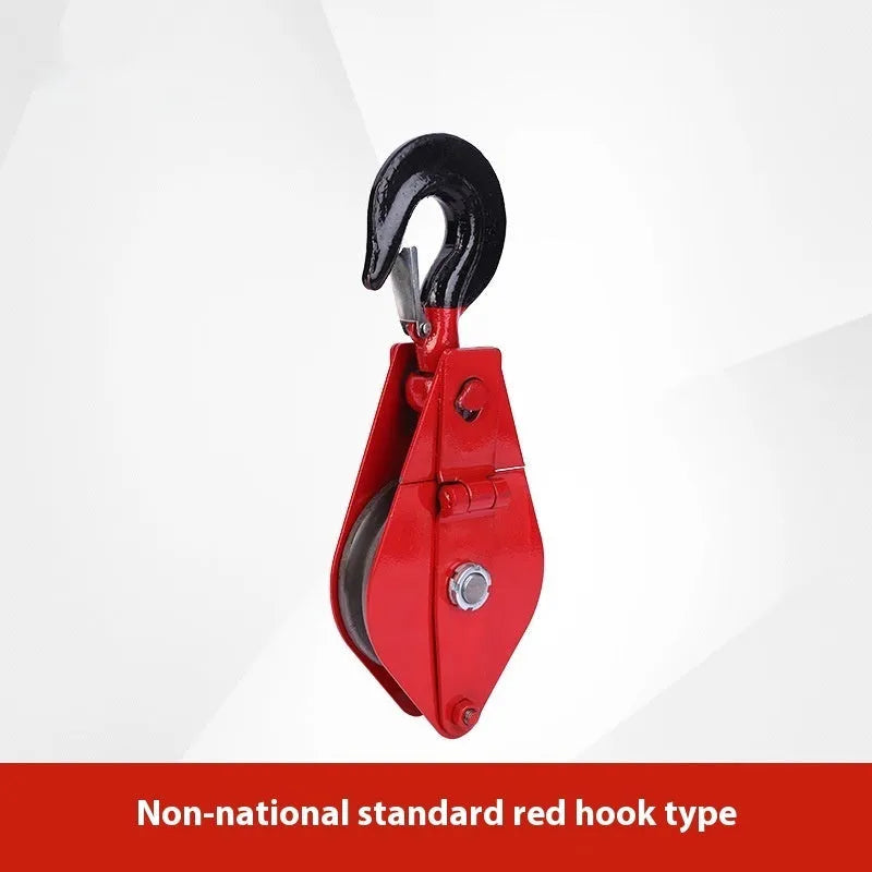 Red industrial lifting pulley with a forged steel safety latch hook and wire rope wheel.