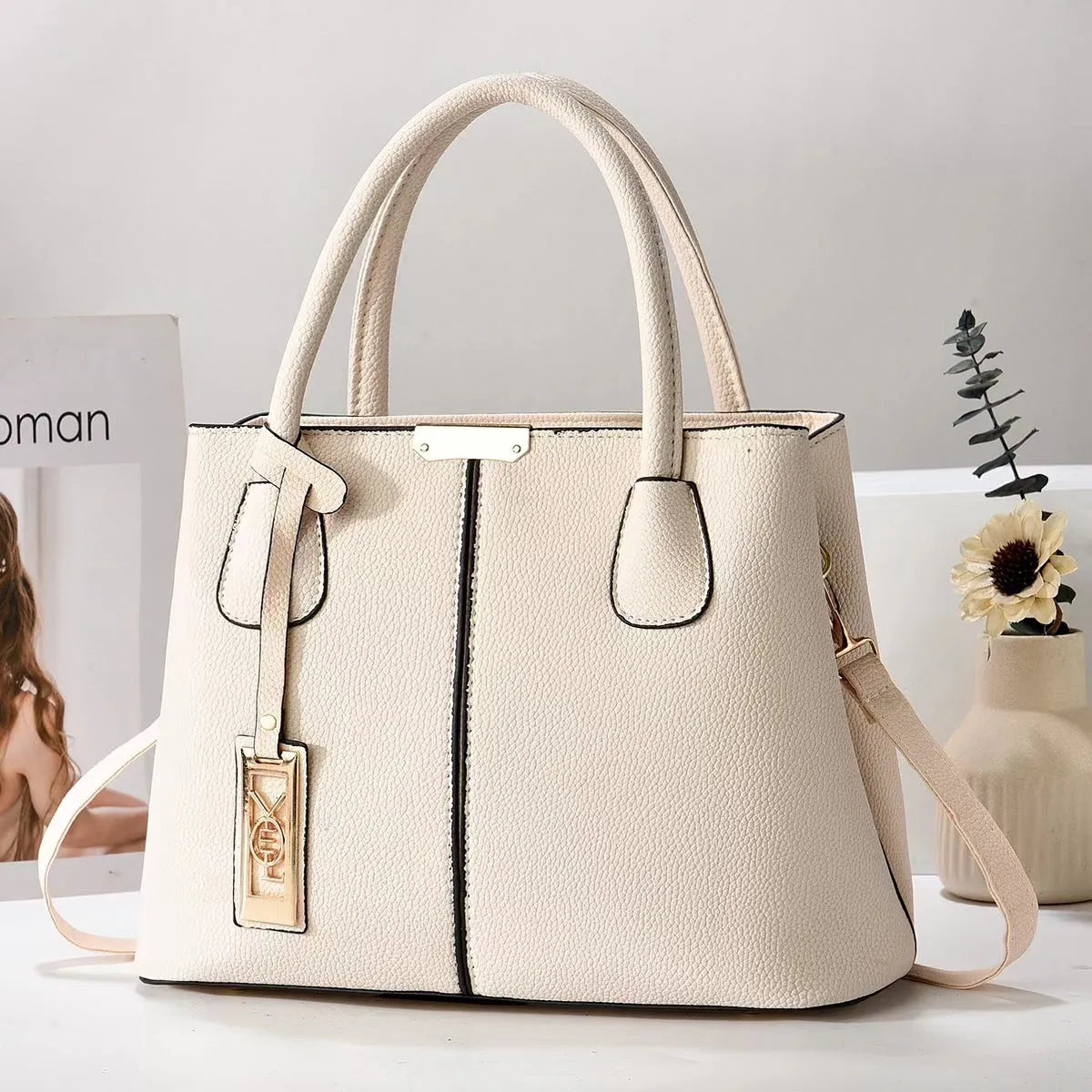 Women's large capacity shoulder bag in soft PU leather with adjustable strap and multiple colour options