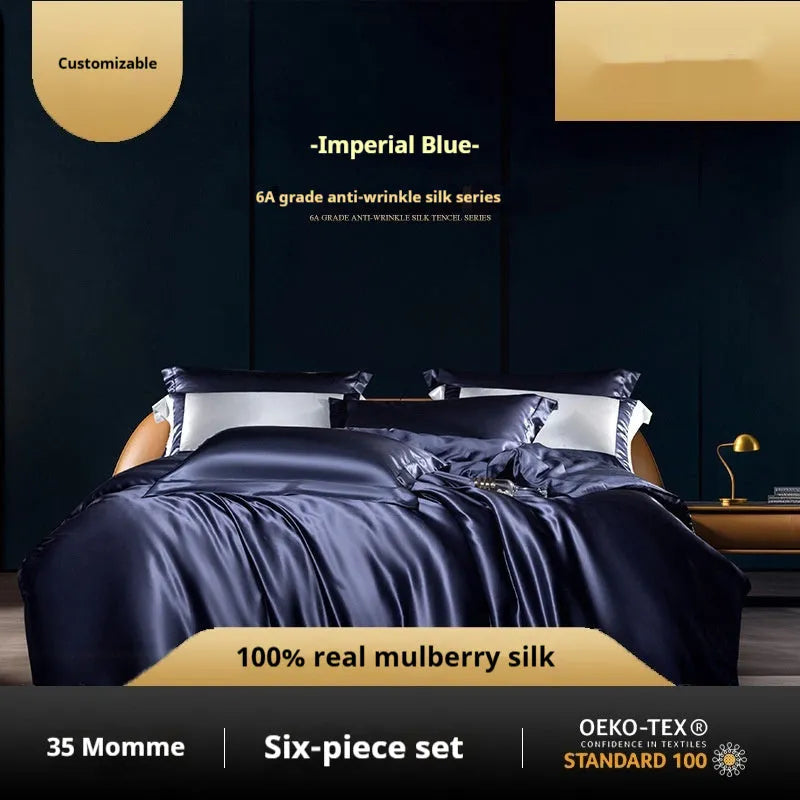 A silk four-piece quilt cover set in a solid colour, shown on a bed with matching sheets.