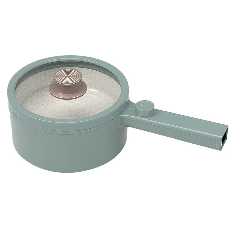 White and green multi-function electric cooking pot with control panel, 600W power, and compact design.