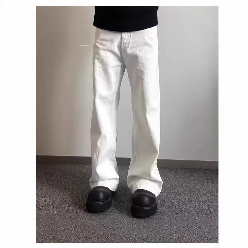 Men's white straight leg jeans with mid-rise waist and zipper fly closure