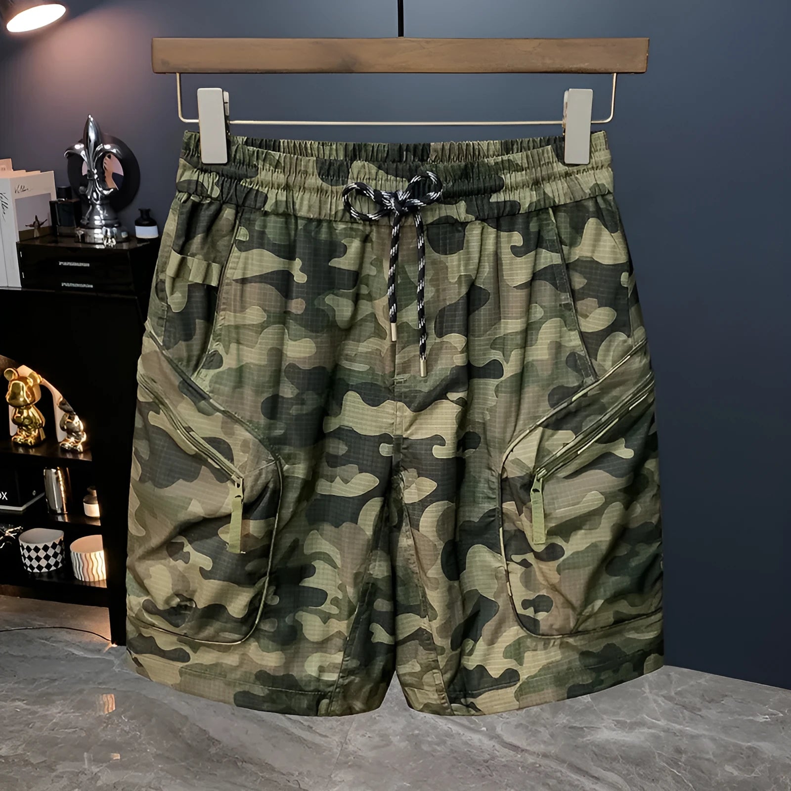 Man wearing loose-fit camouflage cargo shorts made from quick-dry cotton blend fabric