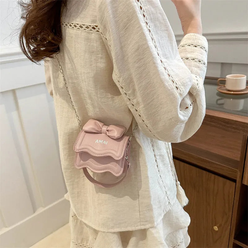 Mini PU crossbody bag in seven colour options with adjustable shoulder strap
