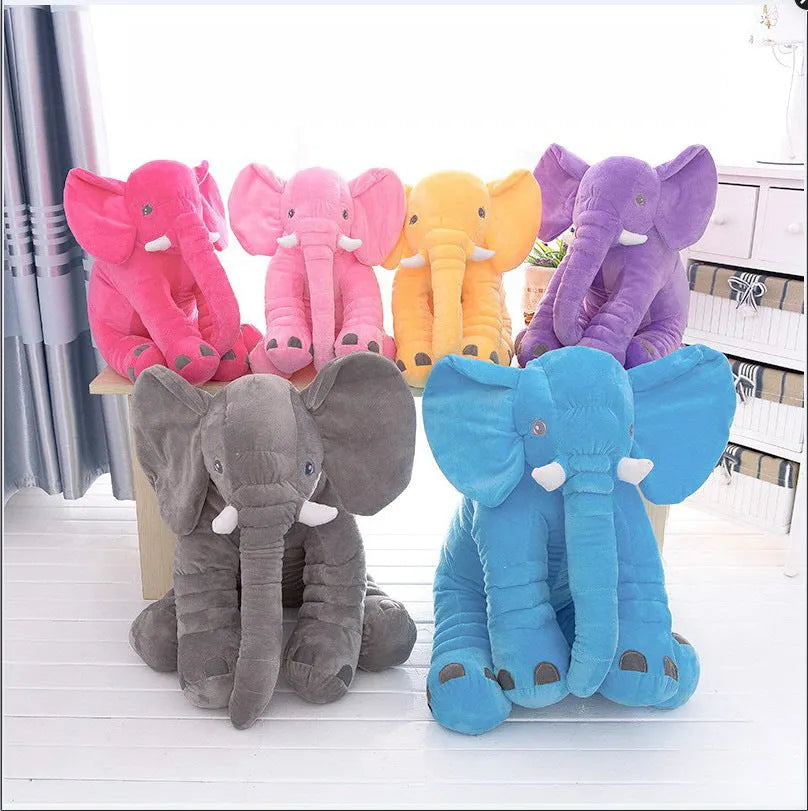 Soft grey elephant plush pillow case for baby sleeping companion on a bed
