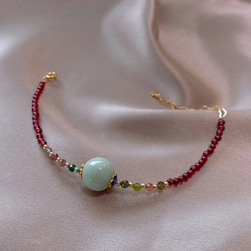 Aquamarine colour tourmaline bracelet with drop shape gemstones and Korean-style design
