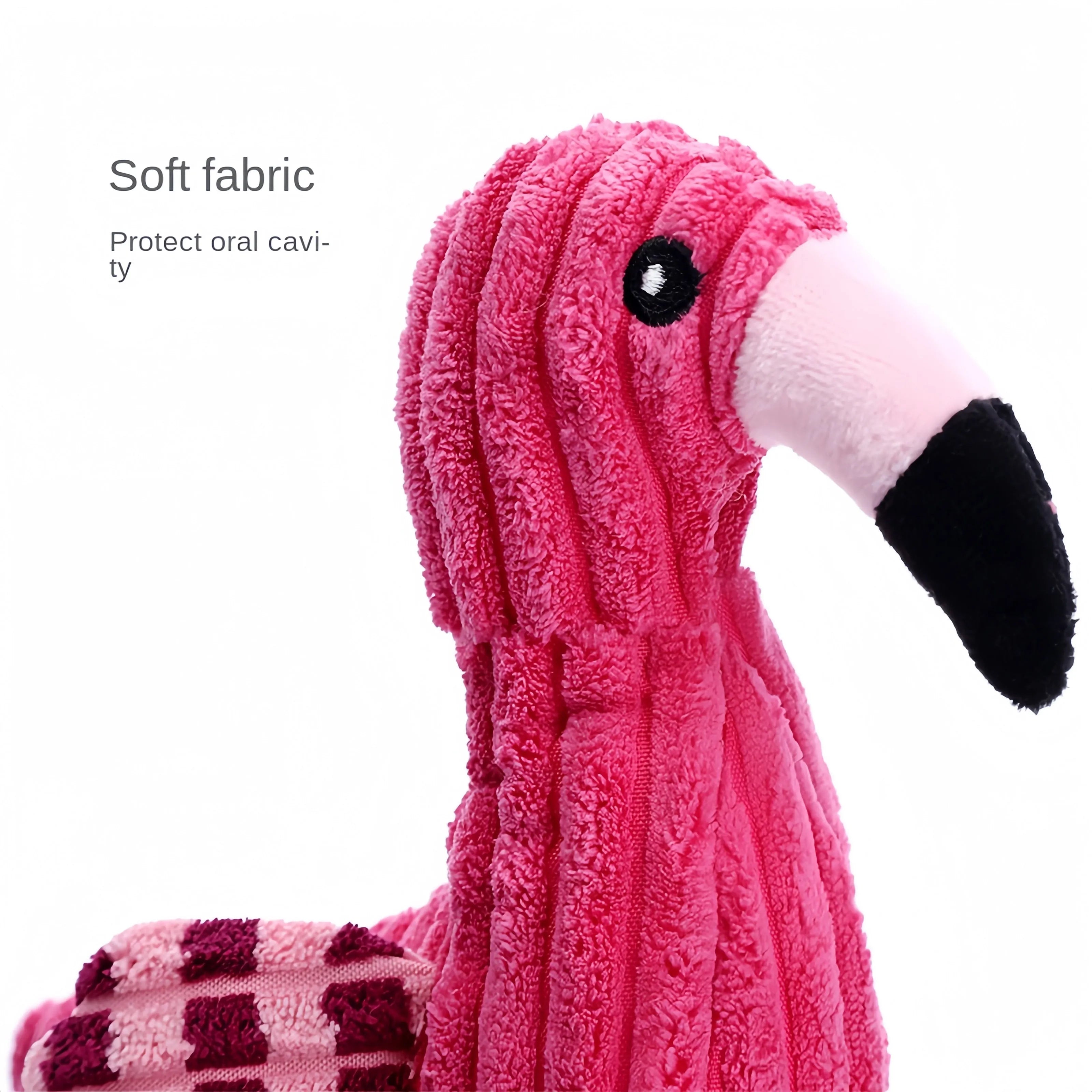 Pink animal-shaped corduroy squeaky dog toy with plush construction