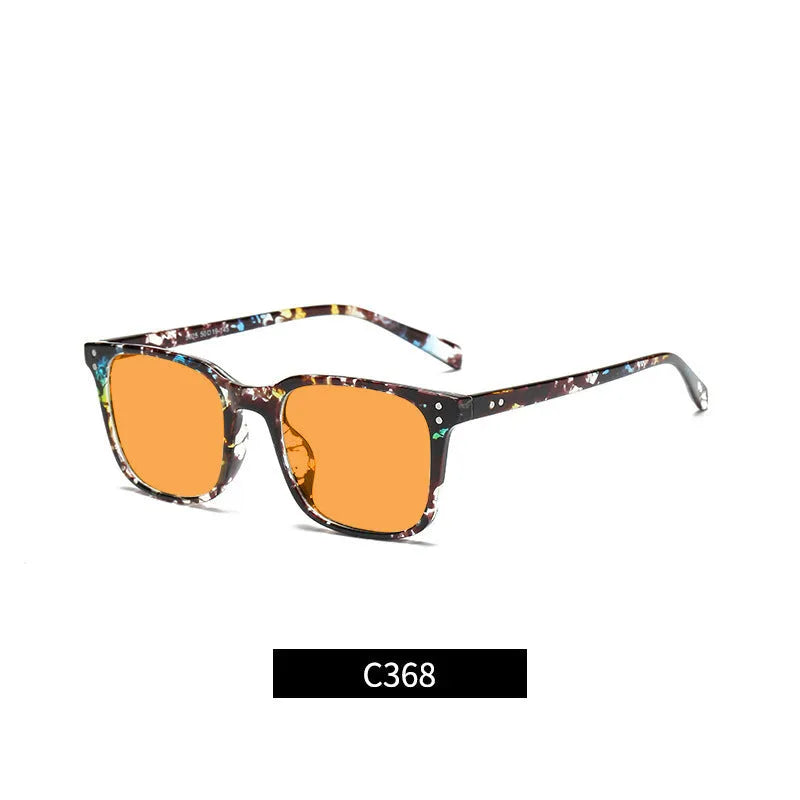Colour-changing orange lens anti-blue light glasses with a TR90 frame on a colour box.