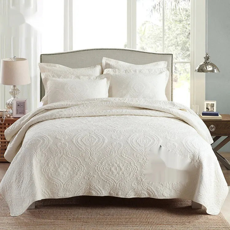 Pure cotton bed cover three-piece set shown in a light colour on a bed, featuring a quilt cover and sheet.
