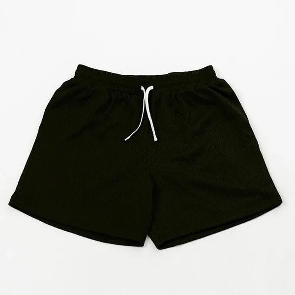 Man wearing black mesh quick-drying shorts for running or fitness training.