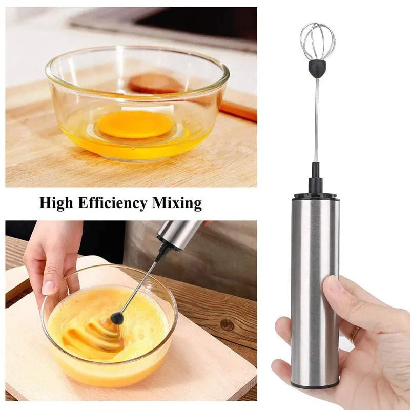 Silver handheld electric milk frother with double teat stainless steel whisk head on white background