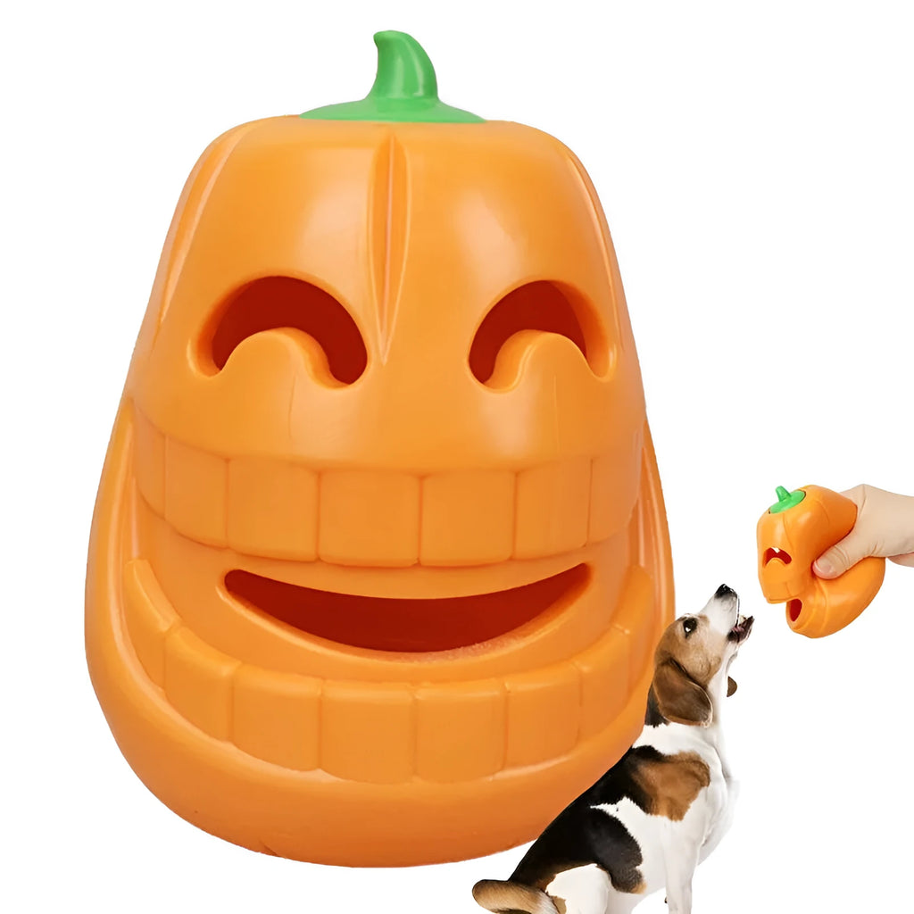 Yellow pumpkin-shaped TPR dog chew toy for aggressive chewers on white background