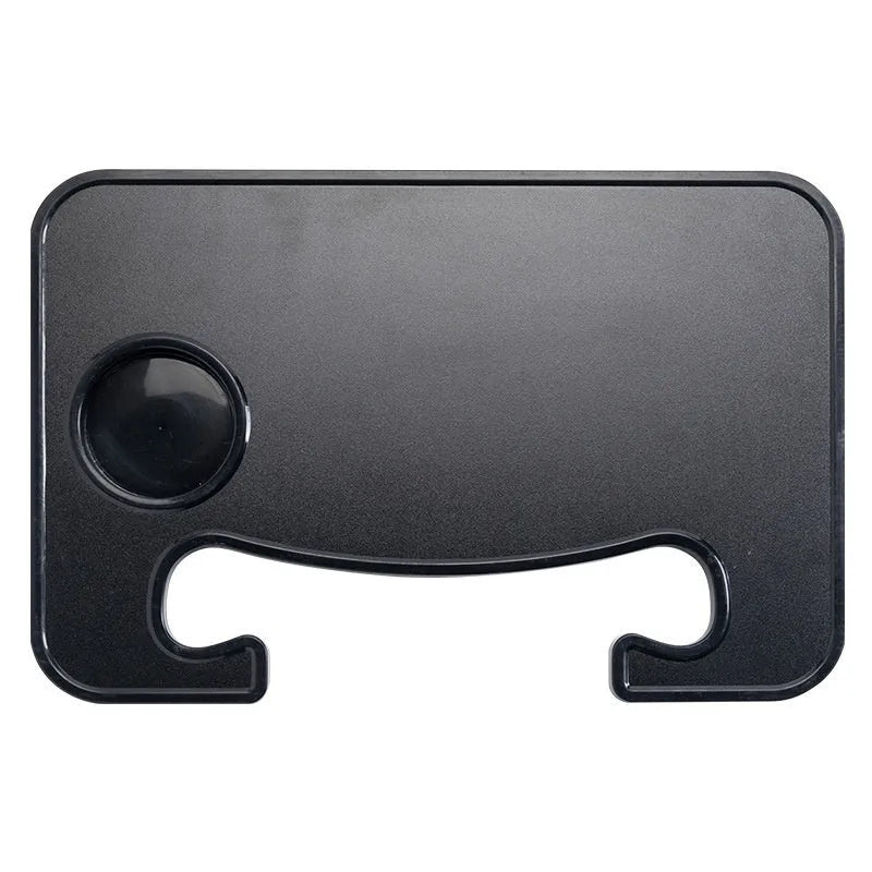 Black ABS plastic car steering wheel laptop stand with foldable design on vehicle dashboard