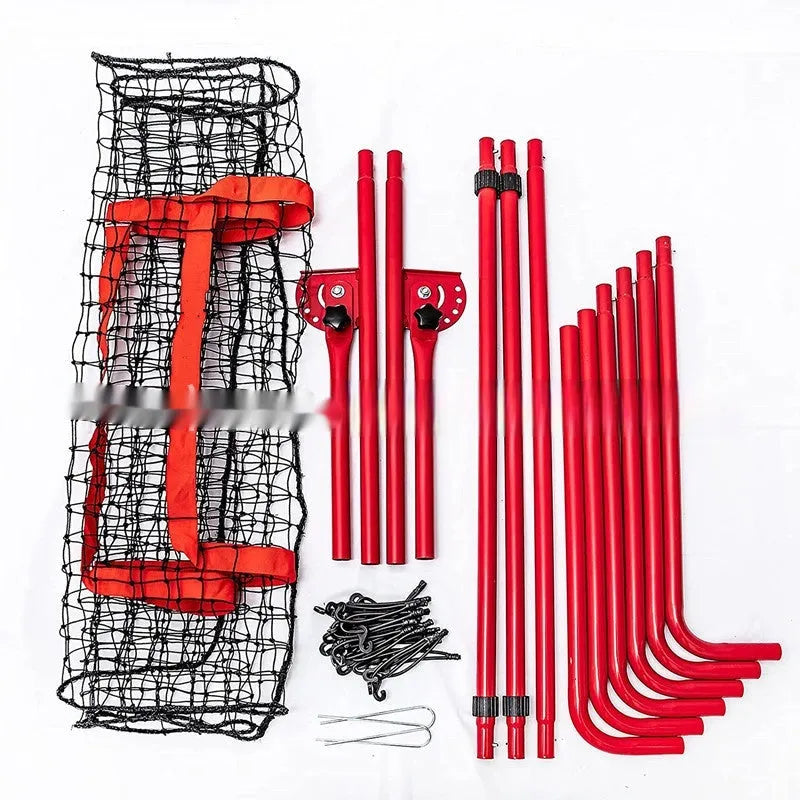 Red portable baseball training net with metal frame set up in a garden.