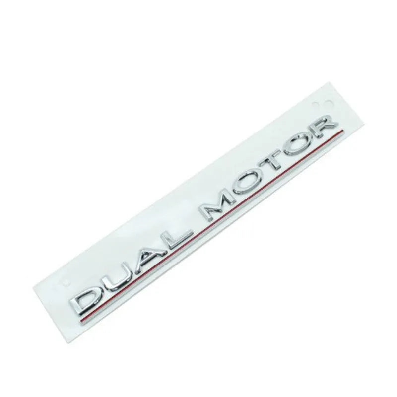 Tesla Model 3 double motor bumper sticker in ABS plastic, 19 cm by 3 cm, showing colour options.
