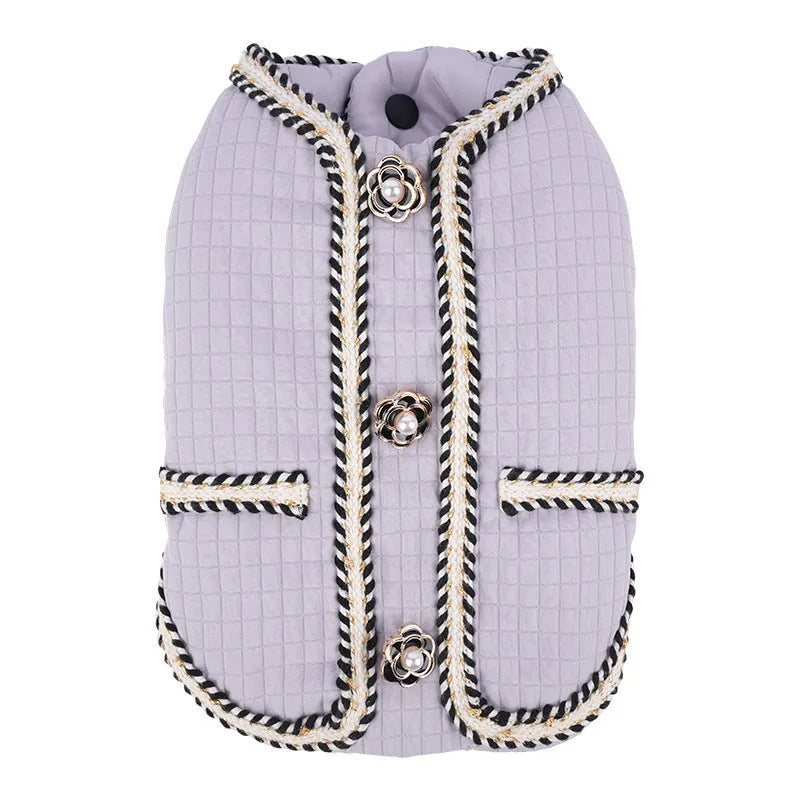 Cartoon-style quilted dog coat in light purple on a small dog.