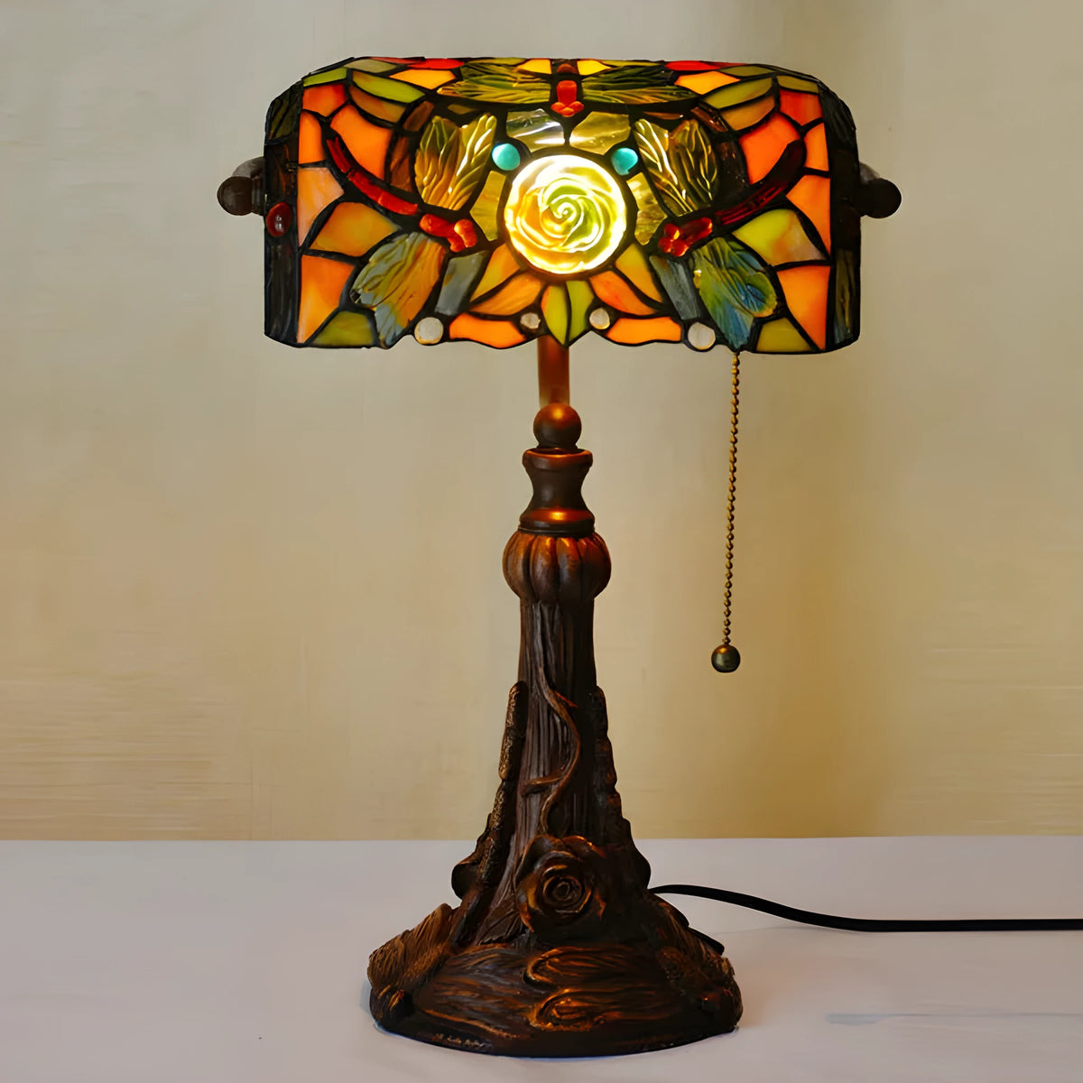 10-inch Tiffany table lamp with stained glass shade and resin base on a study desk