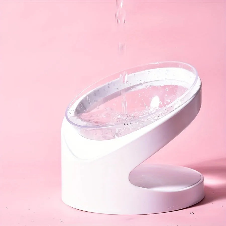 White elevated cat food bowl with clear plastic construction and anti-vomit tilt design