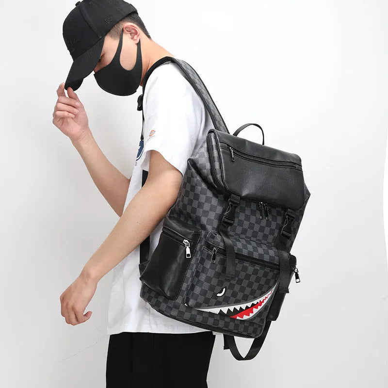 Korean checkered printed black PU leather backpack with curved shoulder straps showing interior polyester lining