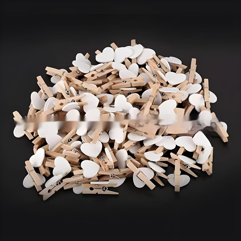 Set of five heart-shaped wooden hair clips in red, pink, white, and yellow colours.
