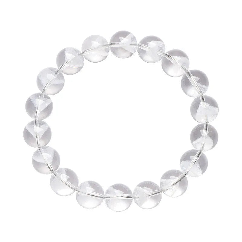 Women's white crystal ghost pyramid bracelet with Ruyi charm on a wrist, showing adjustable sizing.